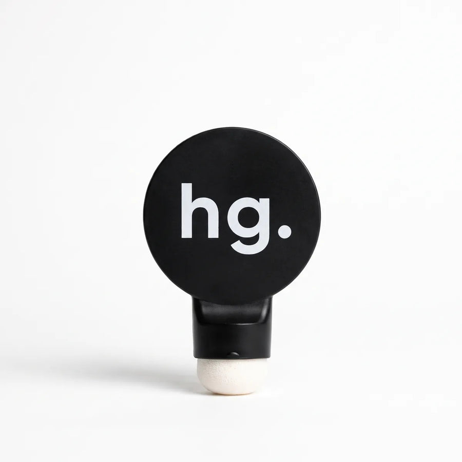 The hg. precision applicator: a thin disc with a small puff